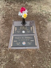Granite companion flat headstone with attached vase